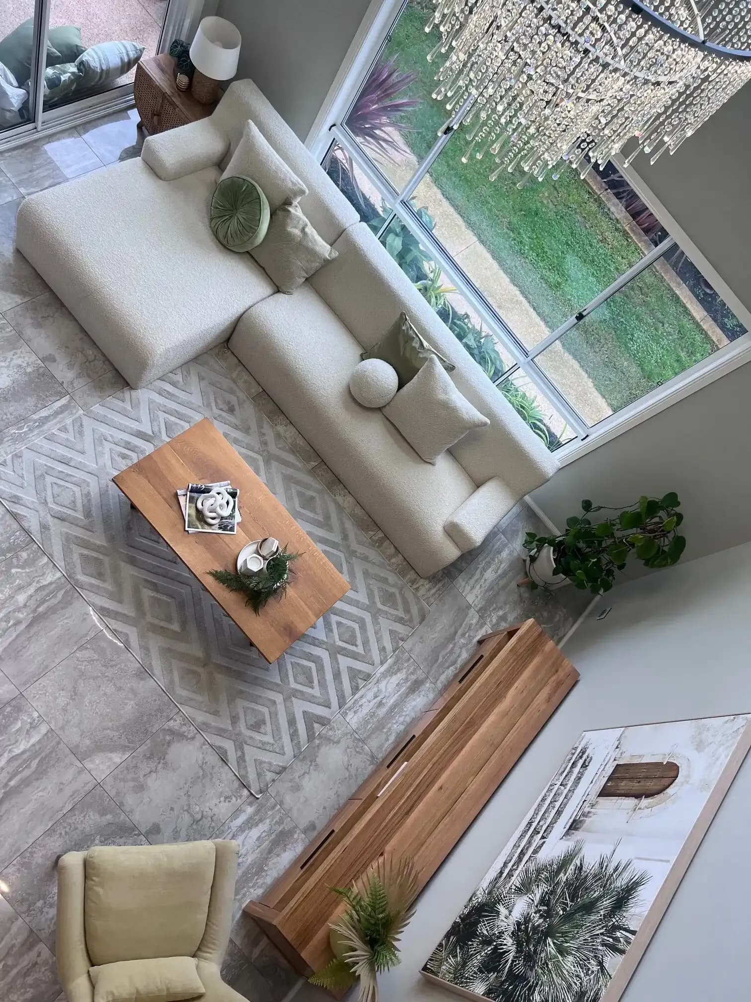 Living room with sofas, a coffee table and large windows